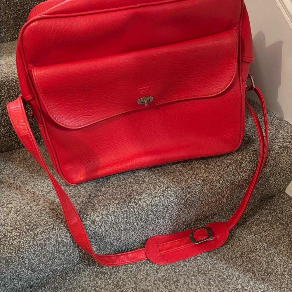Sears Red Travel Bag with Adjustable Strap and Flap Closure